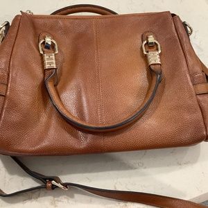 Kattee leather purse. Zipper top. Long strap. 2 short handles.
